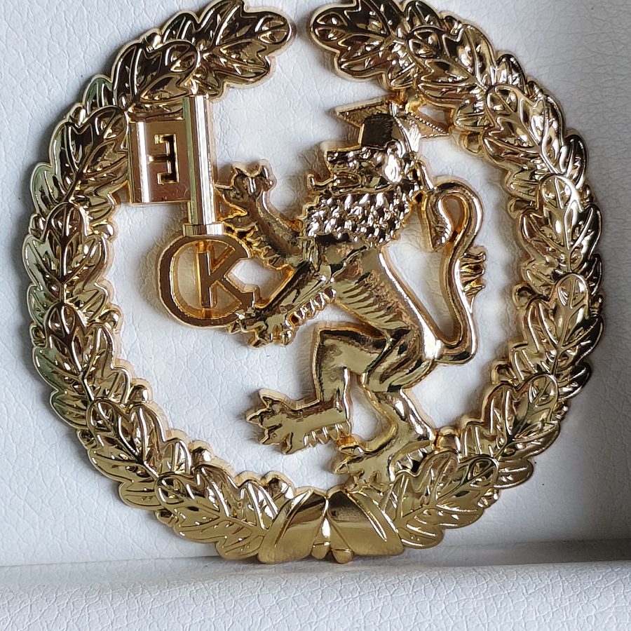 Anniversary badge with gold wreath