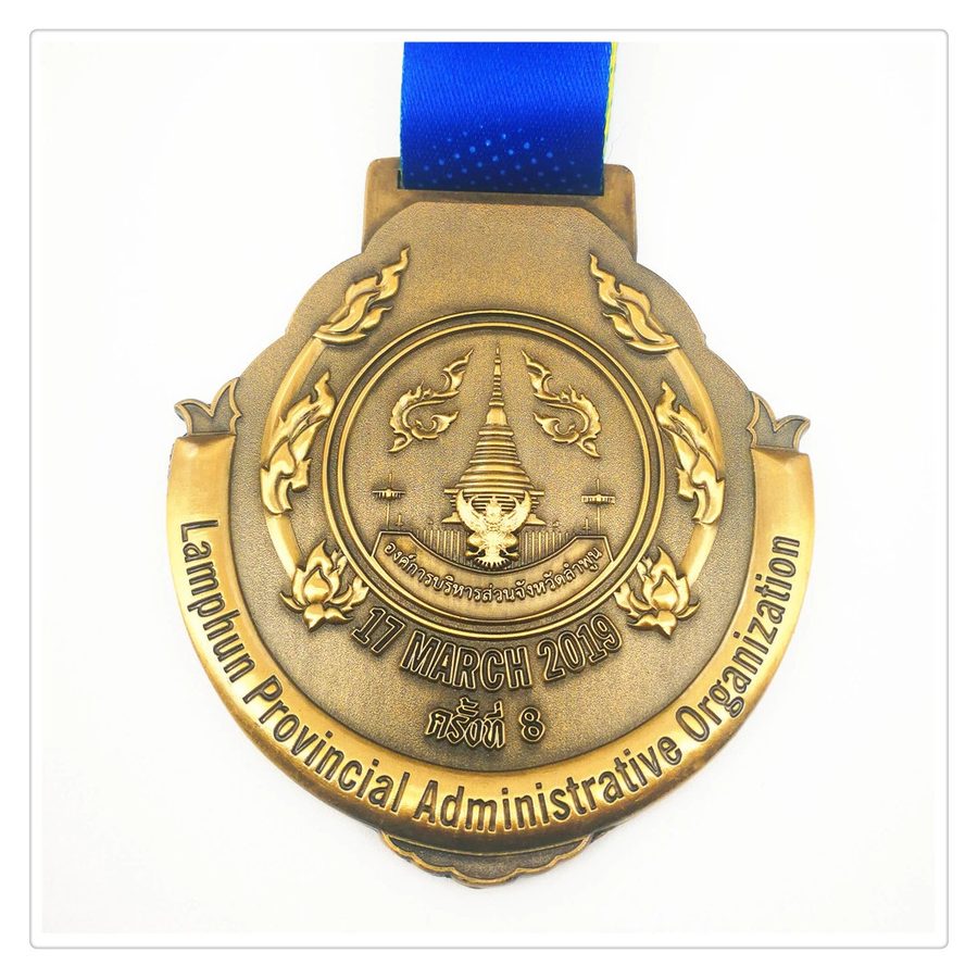 3D cut-out peacock medal